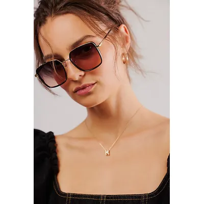 Beau Square Sunglasses at Free People in Blackberry