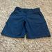 Under Armour Bottoms | Boys Under Armour Navy Blue Golf Shorts. Size Medium. Adjustable Waistband. | Color: Blue | Size: Mb