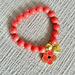 Coach Jewelry | Coach Poppy Bracelet | Color: Orange/Red | Size: Os