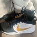 Nike Shoes | Kids Size 4.5 Nike Team Hustle Basketball Shoes. Excellent Condition! | Color: Black/Gold/White | Size: 4.5bb