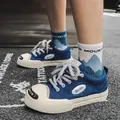 Vendita calda Harajuku scarpe di tela uomo Casual Skate Shoes Fashion Street Hip Hop Canvas Sneakers