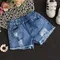 Pantaloncini da bambina Jeans 2024 estate bambini versione coreana pantaloni in Denim pantaloni