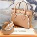 Louis Vuitton Bags | Louis Vuitton On My Side Pm Calfskin Mahina Braided Arizona Leather Tote Bag | Color: Silver/Tan | Size: Pm