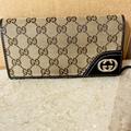 Gucci Bags | Gucci Brown / Tan Canvas Logo Double Gg’s Snap Closure Long Wallet | Color: Brown | Size: Os