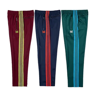 Pantalon de Survêtement pour Homme et Femme Streetwear Multicolore Rayé AWGE Logo Papillon