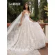 Robes de mariée en tulle romantique A-ligne pour femmes robes de mariée à fleurs appliquées robe