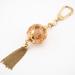 Louis Vuitton Accessories | Louis Vuitton M66779 Portocle Ice Ball Charm Fringe Key Ring Gold Women's | Color: Gold | Size: Os