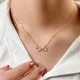 Huitan Fancy Clavicle Chain Necklace for Women Infinity Figure 8 Pendant with Shiny CZ Gold Color