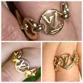 Louis Vuitton Jewelry | % Authentic Louis Vuitton Interlock Monogram 18k Gp Ring #8.5 Gold | Color: Gold | Size: 8.5