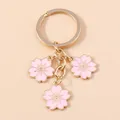 Aazole-Porte-clés fleur en émail pour femmes et filles breloques Sakura pendentif pour porte-clés