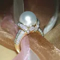Huitan elegante Imitation Perle Gold Farbe Eheringe Frauen glänzend cz romantische Hochzeits