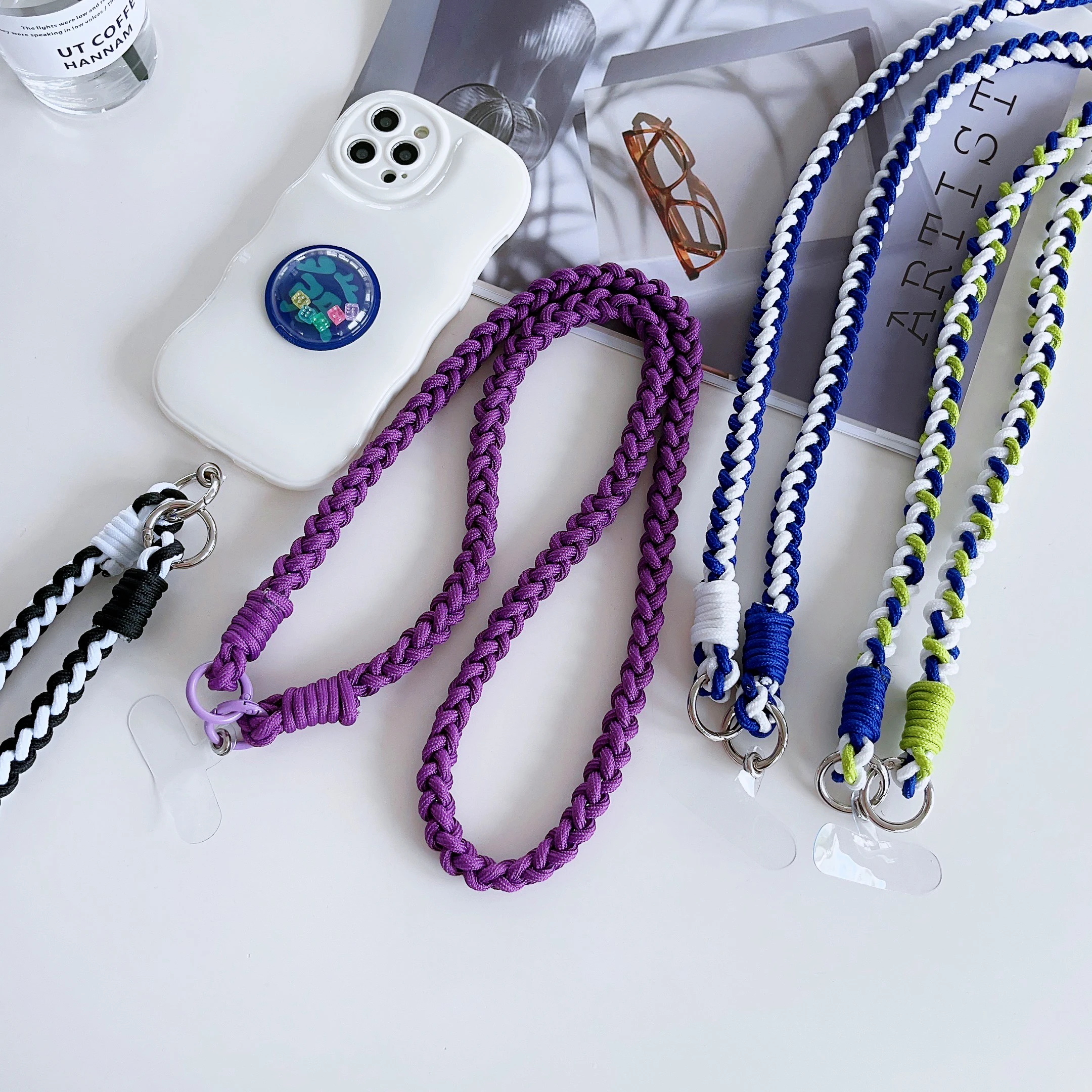 Neues handgewebtes viersträngiges Handy-Lanyard. Handschlaufe. Umhängetaschengurt. Schultergurt, Anti-Verlust-Seil Image