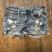 American Eagle Outfitters Shorts | American Eagle Super Low Shortie Cutoff Distressed Denim Blue Jean Shorts Size 2 | Color: Blue | Size: 2