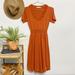 Anthropologie Dresses | Anthro | Isabella Sinclair Jacinth Rust Knit Sweater Dress Ruffle Trim Xs | Color: Orange/Red | Size: Xs