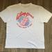 American Eagle Outfitters Shirts | American Eagle The Rolling Stones It's Only Rock N Roll Distressed T-Shirt | Color: White | Size: Xl