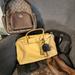 Coach Bags | 6 Piece Coach Bundle - 4 Bags And 2 Wristlet | Color: Brown/Yellow | Size: Os