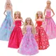 30cm Puppe Kleidung niedlichen Bogen Prinzessin Kleid modischen Anzug Blumen Gaze Rock für Barbies