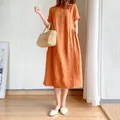 Robe pull orange à manches courtes et col rond pour femmes robes mi-mollet monochromatique chic