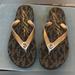 Michael Kors Shoes | Michael Kors Bronze Metallic Flip Flops. | Color: Brown | Size: 7