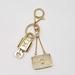Louis Vuitton Accessories | 100% Authentic Louis Vuitton Lock And Key Keycharm | Color: Gold | Size: Louis Vuitton
