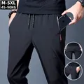 Pantaloni lunghi Casual da uomo pantaloni sportivi taglie forti pantaloni elasticizzati estivi