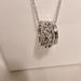 Coach Jewelry | Coach Silver Necklace With 3 Charm 18" Has Extender Nwt $125 Retail | Color: Silver | Size: 18"