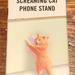 Urban Outfitters Cell Phones & Accessories | Laughing Cat Urban Outfitters Phone Stand With Suction Cup For Iphone Or Android | Color: Orange/White | Size: Os