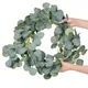 Guirxiété artificielle d'eucalyptus plante de vigne artificielle fausse vigne arc de fond de