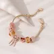 Bracelet à breloques en forme de cœur creux pour femme accessoire de mode en verre et cristal