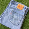 Size 34 Vintage Distressed Levis 550 Jeans W34 L32 Light Wash Denim Relaxed Fit Made in Lesotho Waist 34