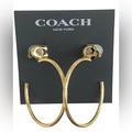 Coach Jewelry | Coach Gold 1.5” Signature Hoop Earrings With Crystal Logo | Color: Gold | Size: Os