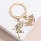 Porte-clés couronne en émail fleur fée cristal ailes pour femmes filles accessoire de sac à