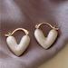 Anthropologie Jewelry | Anthropologie White Heart Shaped Mini Hoops Gold New | Color: Gold/White | Size: Os