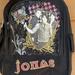 Disney Other | Disney Jonas Brothers Black Large Multi Pocket School Sleepover Backpack 16” | Color: Black | Size: Large