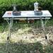 Red Barrel Studio® Noraida Rectangular 20.3" L x 35.4" W Outdoor Camping Table | Wayfair B6F1BC25630A4F578528ACD19210D5EA