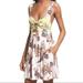 Free People Dresses | Free People Size Xs Baby It’s You Ivory Printed Criss Cross Swing Pocket Dress | Color: Cream/Purple | Size: Xs