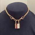 Louis Vuitton Jewelry | New Louis Vuitton Gold-Tone Lock With 16" Box Link Chain Choker Necklace | Color: Gold | Size: Os