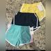 Nike Bottoms | 3 Pair Nike Dri Fit Shorts Nwt Size 6x Yellow ,Navy Blue,Pastel Teal. All Nwt | Color: Blue/Yellow | Size: 6xg