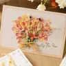 1 pz di carta colorata squisiti biglietti di auguri di fiori secchi distribuito a caso per natale