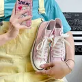 2024 donne tinta unita scarpe di tela rosa ragazze studenti stivali corti Lace Up Sneaker di gomma