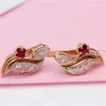 585 lila Gold Kristall Ohrringe für Frauen kreativ eingelegte rote Edelstein Ohr stecker Mode