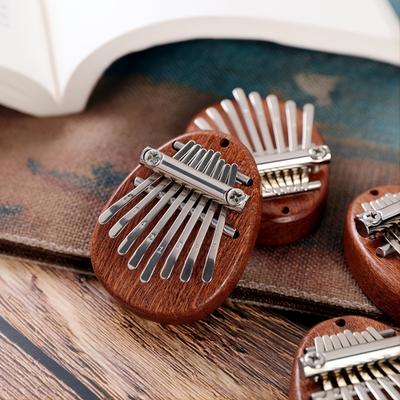 8-key Mini Kalimba: A Perfect Gift For Music Lovers & Beginners!