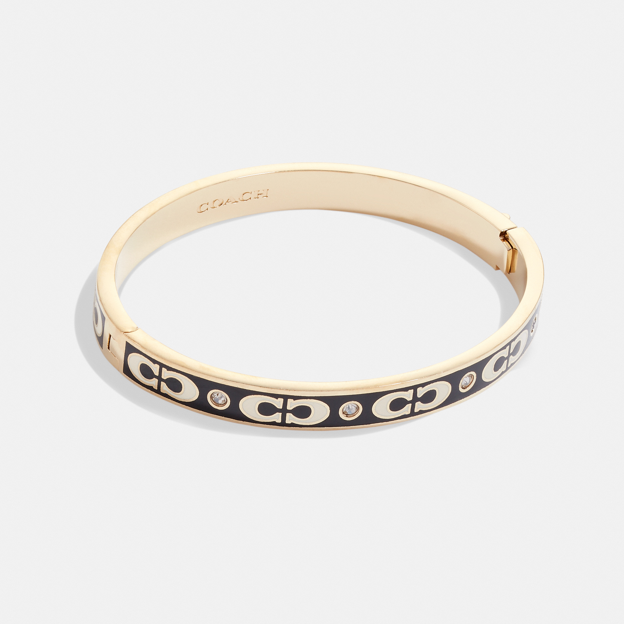 Coach Womens Kissing C Enamel Hinged Bangle - Black/gold Metal - One Size | Coach Sale | Discount Designer Brands