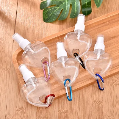 1 Pcs Portable Spray Love Bottle with Random Color Hook Travel Plastic Bottle Hand Sanitizer Bottled White Spray Head 50ml