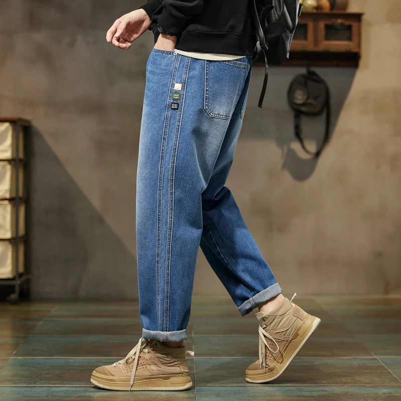 Pantaloni larghi Pantaloni Harem blu retrò vestibilità ampia Abiti vintage Jeans larghi Pantaloni Harem da uomo Tasche alla moda a gamba larga