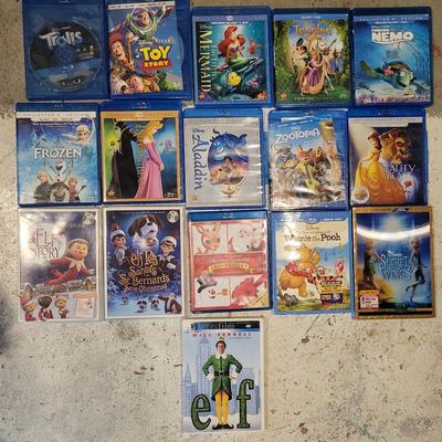 Disney Other | 16 Dvd Blu-Ray Movies Disney Classics Nemo Mermaid Elf Christmas Classics | Color: Tan | Size: Os