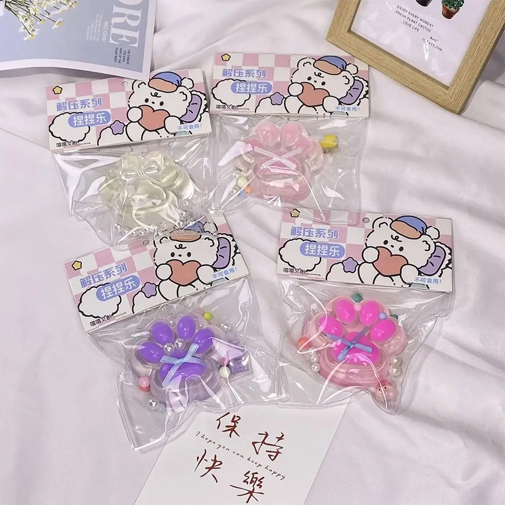 Taba Squishy Bow Zampa di gatto Agitarsi Giocattoli Carino Rosa Piede di gatto Giocattolo di rimbalzo lento Bagnato Morbido Antistress Pizzico Giocattolo sensoriale di decompressione