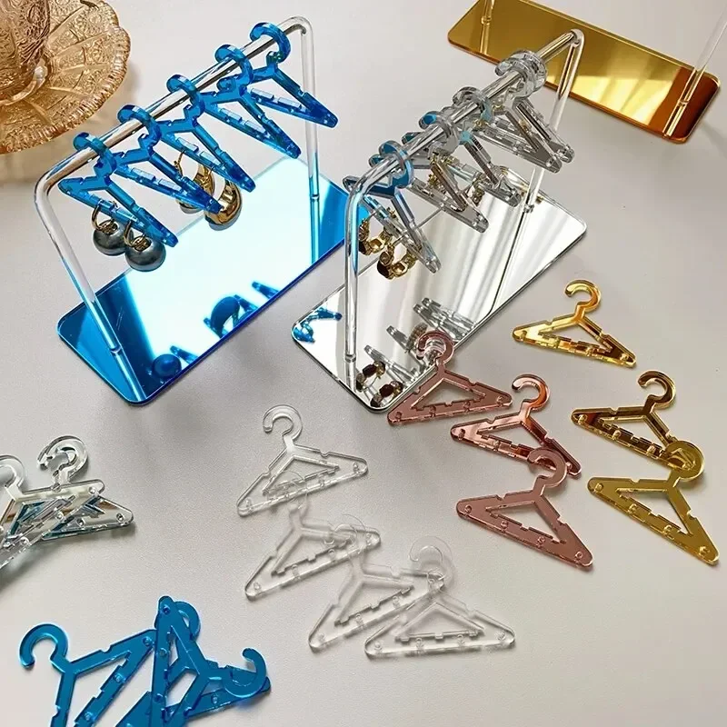 Neue 8-teilige einfarbige kleine Kleiderbügel in Form von Schmuckhaltern, baumelnde Ohrringe, Aufbewahrung, Persönlichkeit, Schmuck-Organizer-Halter Image