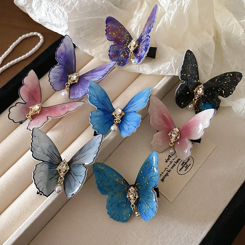 2-teiliges Acryl-Schmetterlings-Imitationsperlen-Strassstein-Entenschnabel-Haarspangen für Frauen, Fairycore, einfaches, vielseitiges Modeschmuck-Set Image