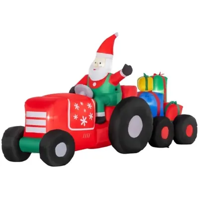 Santa Claus drives a trailer with colorful inflatable gift boxes, and the white LED lights create an